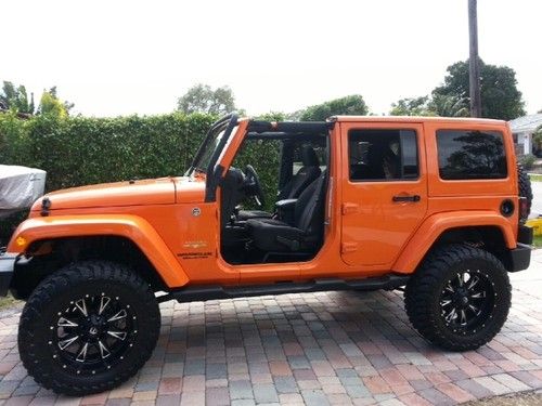 2013 jeep wrangler unlimited sahara sport utility 3.6l**custom 35in tires ******