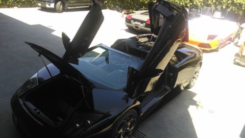 2006 lamborghini murcielago roadster with quarter panel and brand new door!