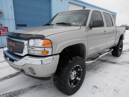 2006 gmc sierra sle crew cab w/4" lift extra clean 44,080 miles