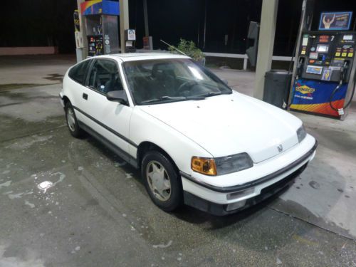 White si, stock, sunroof, 5 speed