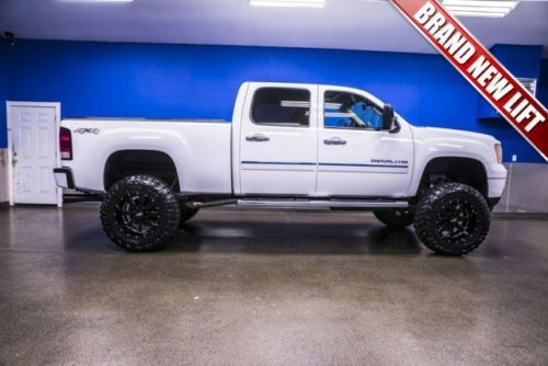 One 1 owner low miles 6.6l duramax diesel lifted crew cab running boards tonneau