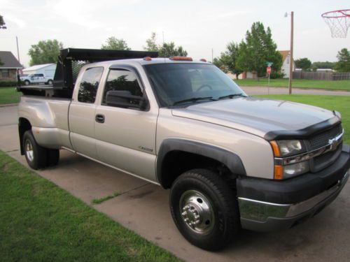 2004 chevy 3500   dump truck with dumper dogg insert