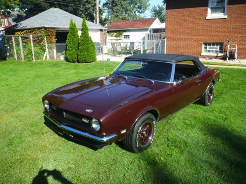 1968 convertible with 327 automatic black interior burgandy w black top