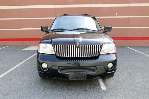 2004 lincoln navigator black 68k. factory dvd warranty