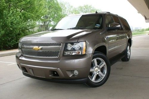 Suburban ltz, dual dvd ent, navi, 13k miles, $57k msrp, 2.95% apr financing!