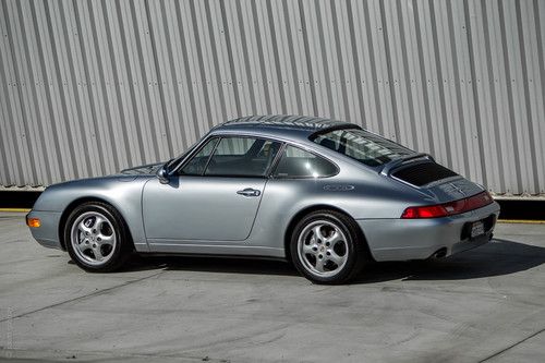 1995 porsche 993 carrera 4 coupe / 6spd / awd / polar silver + black