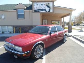 Jaguar red 4 door sedan automatic sunroof leather