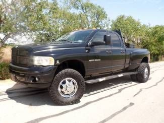 Texas 03 5.9l cummins turbo diesel - 6 speed - 4x4 - laramie - must see - xtras!