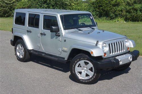 2011 jeep sahara unlimited~navigation~leather~heated seats~loaded beautiful jeep