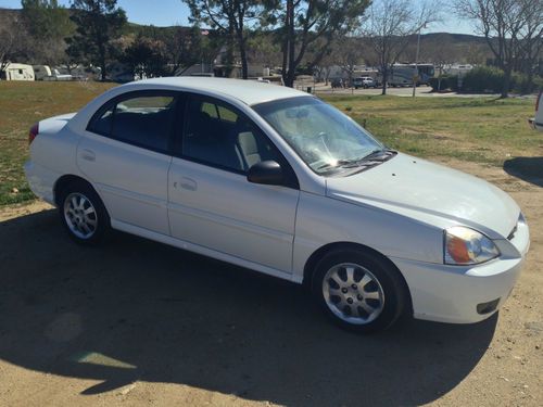 2003 kia rio base sedan 4-door 1.6l gas saver economy white car low miles clean