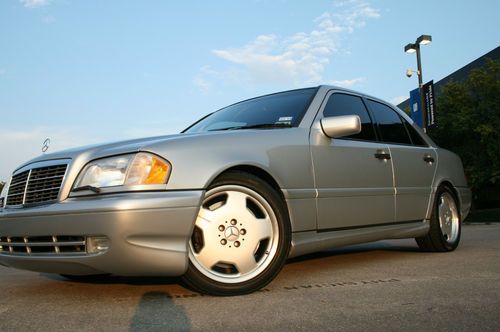 1999 mercedes benz c43 amg silver with two tone black and light grey interior