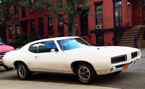 Beautiful documented 69 gto, 4 speed, hideaway lights, posi, buckets/consol