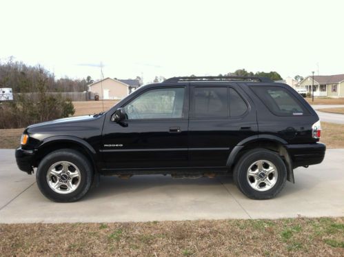 Black 2003 isuzu rodeo s  4-door 4x4 v6 109797 miles!! clean, 2 owner!