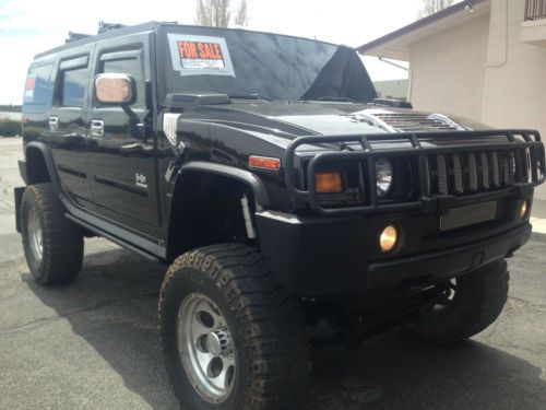 Custom lifted  hummer h2 2003 black, king shocks, remote start, lots of extras..