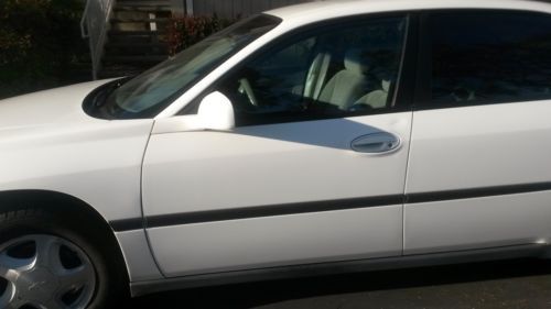 White 2003 chevy impala 4 door sedan, clean title, v6 engine, automatic