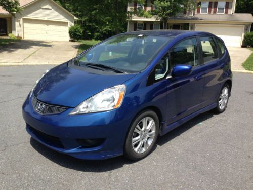 Honda fit sport, very clean car for the year, runs and drives great, gas saver