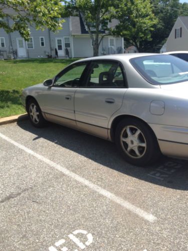 Fully loaded silver 2002 buick regal ls with approximately 150,000