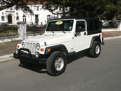 Wrangler unlimited low miles hard and soft tops auto trans cruise a/c clean