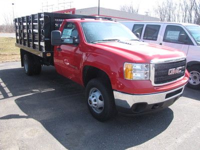 Warranty tow package excellent condition 4x4 stake truck dually