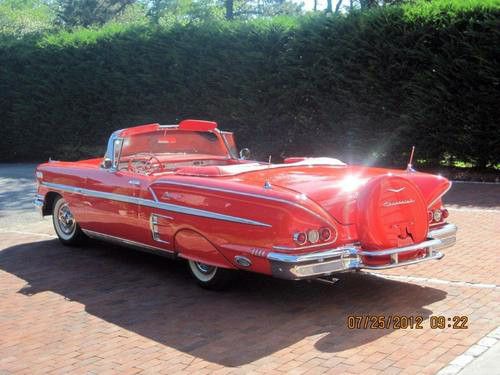 Chevrolet impala convertible 1958 rio red with the 348 frame off restored
