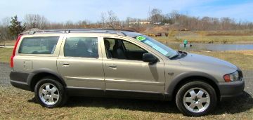 Volvo v70..2003..5 speed ..ash gold ext. /beige sand int.  128k miles