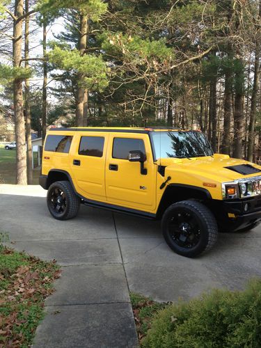 2005 h2 yellow nav dvd rims