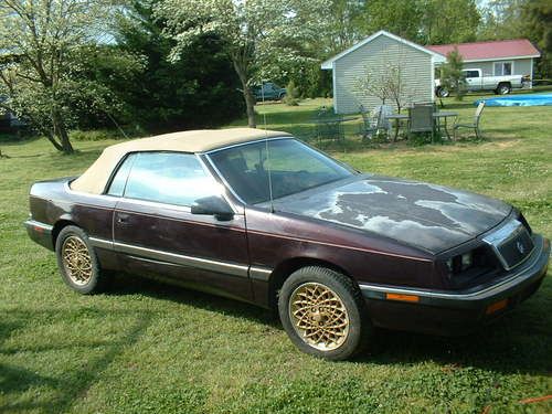 1990 chrysler lebaron convertible 47k miles damaged ,  for parts  or restore