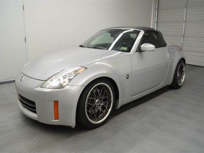 Touring covertible 6 speed low miles premium wheels financing available save $$$