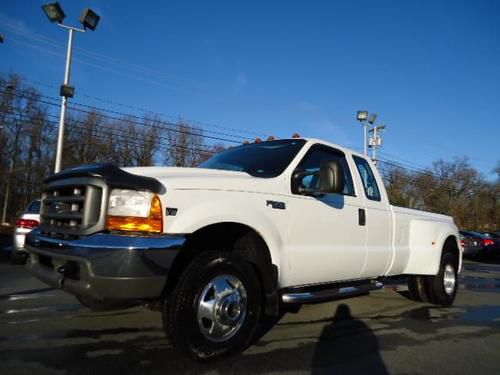 4x4 7.3 liter powerstroke diesel 6speed manual ext cab dually 1 owner wont last!