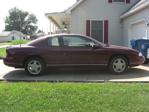 Maroon 1999 chevy monte carlo, leather interior auto overdrivetrans sun roof