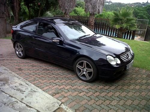 Midnight blue, new condition, sports coupe, turbo