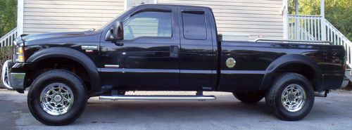 2007 f-250 super duty 6.0 diesel, super cab black 4x4,, performance upgraded