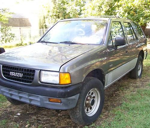 1993 isuzu rodeo/2.6l engine to install/set of 5 stock snow flake rims!!!