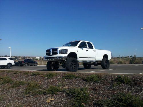 Lifted tgc dodge 2500 cummins 6.7l, h&amp;s mini max straight pipe 24" rims