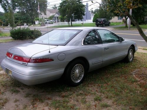 Beautiful silver 2 door hardtop , with all gray leather interior