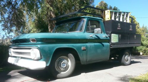 1966 chevy flatbed pickup with tool boxes and ladder rack