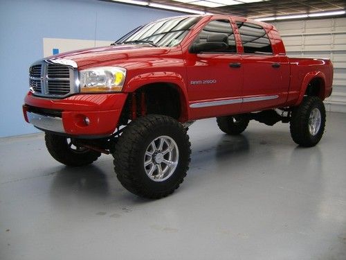 We finance!!!  dodge ram 2500 hd mega laramie 4x4 5.9 cummins auto lift tv/dvd!!