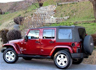 Unlimited jeep wrangler sahara xtra clean loaded garaged l@@k no reserve