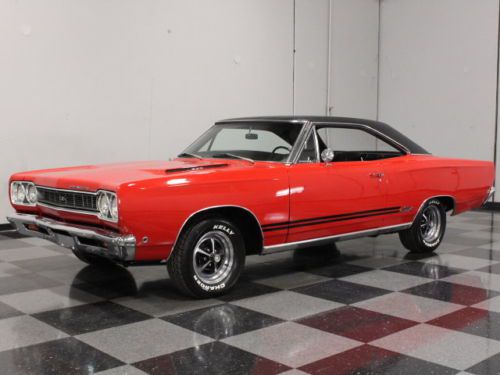 Built 440 ci, matador red on black vinly buckets, factory tach, beautiful resto!