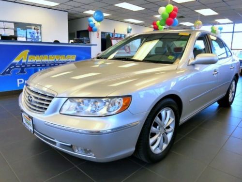 We finance luxury sedan auto heated leather seats sunroof 6 cd silver low miles