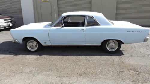 Baby blue 2 dr sedan
