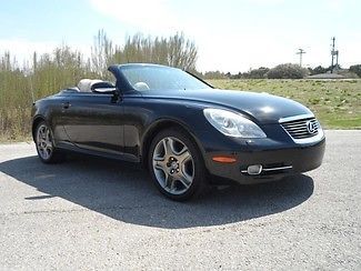 06 convertible loaded salvage title low miles is hardtop