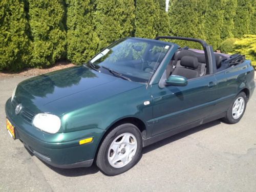 Convertible, 2.0 liter 4 cyl. automatic, tilt, cruise, a/c, heated seats