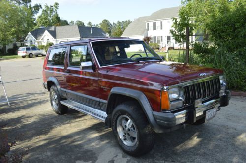 Jeep 1990 cherokee laredo 4 wheel drive 6 cylinders red