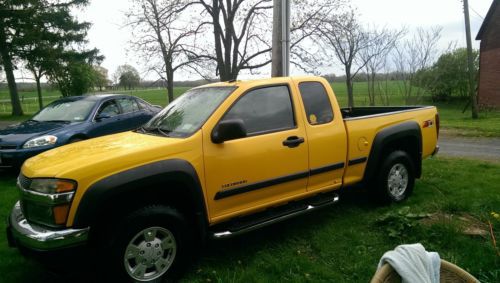 4x4, excellent condition, yellow, extended cab, 4 door, running boards, z71