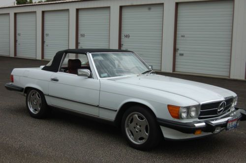 White w/ red interior pristine mercedes benz 560 sl