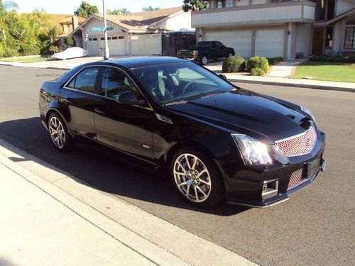 Cts-v super charged black beauty, very low milage with all factory option!