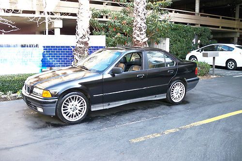 1992 bmw 325i,5spd,black on black leather,low miles 18"m alloys,clean