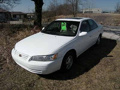 97 white tan leather sunroof alloy wheels 4 cyl auto sedan runs great very clean