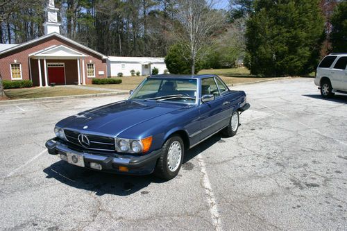 Dark blue, automatic, 76k miles, pristine condition with hard and soft tops.